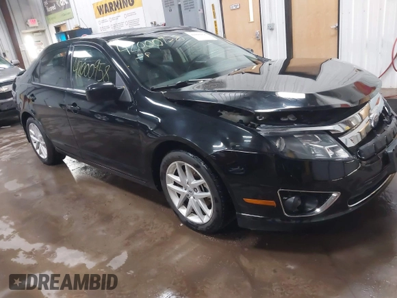 2012 Ford Fusion SEL z VIN 3FAHP0JA8CR125067, wystawiony jako IAAI lot #42000958 z przebiegiem 101 140 mil mil oraz . Historia ofert i sprzedaży dostępna na DreamBid. Obrazek 1.