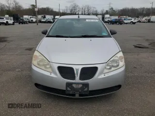 2009 Pontiac G6 1SA z VIN 1G2ZG57N894137408, wystawiony jako Copart lot #51671705 z przebiegiem 130 613 mil mil oraz Czysty tytuł • Clean title. Historia ofert i sprzedaży dostępna na DreamBid. Obrazek 5.