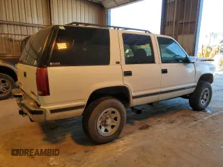 1996 GMC Yukon with VIN 1GKEK13R6TJ756550, listed as a Copart auction lot 88435135 with 204,254 mi miles and Salvage Title. Bid and sale history available at carsss.com. Image 3.