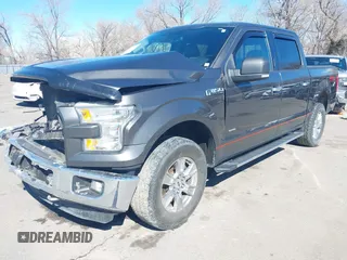 2015 Ford F-150 XLT with VIN 1FTEW1EG4FFC84691, listed as a IAAI auction lot 41651229 with 144,784 mi miles. Bid and sale history available at carsss.com. Image 2.