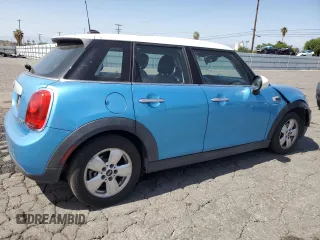 2015 MINI Hardtop 4 Door z VIN WMWXS5C5XFT827473, wystawiony jako Copart lot #58261135 z przebiegiem 75 439 mil mil oraz Szkoda całkowita • Salvage title. Historia ofert i sprzedaży dostępna na DreamBid. Obrazek 3.