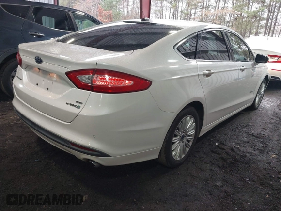 2013 Ford Fusion SE Hybrid with VIN 3FA6P0LU1DR357428, listed as a IAAI auction lot 41153491 with 153,738 mi miles. Bid and sale history available at carsss.com. Image 4.
