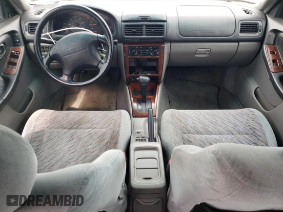 1999 Subaru Forester S with VIN JF1SF6555XH730230, listed as a Copart auction lot 71795924 with 103,455 mi miles and Salvage Title. Bid and sale history available at carsss.com. Image 8.