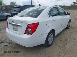 2014 Chevrolet Sonic LT with VIN 1G1JC5SH2E4162166, listed as a IAAI auction lot 42105408 with 122,854 mi miles and . Bid and sale history available at DreamBid. Image 4.