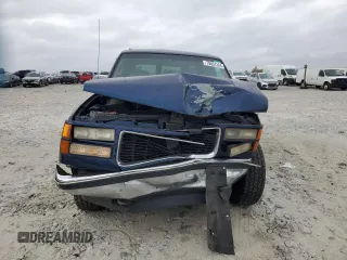 1997 GMC Suburban with VIN 3GKFK16R4VG519902, listed as a Copart auction lot 79031204 with 195,624 mi miles and Salvage Title. Bid and sale history available at DreamBid. Image 5.