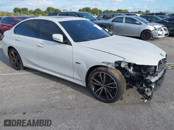 2022 BMW 3 Series 330e with VIN 3MW5P7J08N8C65252, listed as a IAAI auction lot 41229681 with 27,606 mi miles. Bid and sale history available at carsss.com. Image 1.