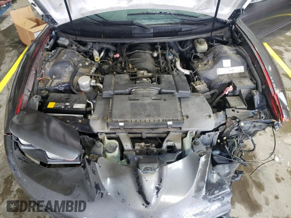 1999 Pontiac Firebird Formula с VIN 2G2FV22G1X2211237, выставлен на аукционе Copart как лот 57750415 с пробегом 134 236 миль миль и Списание • Salvage title. История ставок и продаж доступна на DreamBid. Изображение 11.
