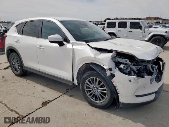 2019 Mazda CX-5 Sport with VIN JM3KFBBMXK0688621, listed as a Copart auction lot 46988335 with 88,031 mi miles and Clean Title. Bid and sale history available at DreamBid. Image 4.