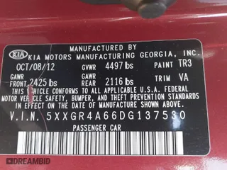 2013 Kia Optima SX w/Limited Pkg with VIN 5XXGR4A66DG137530, listed as a IAAI auction lot 41940486 with 124,605 mi miles. Bid and sale history available at carsss.com. Image 9.