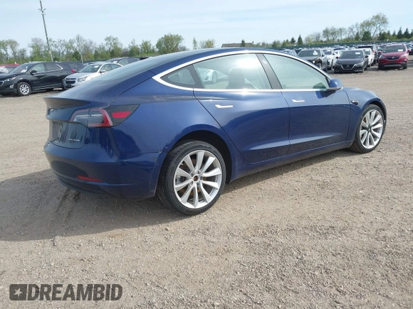 2018 Tesla Model 3 Long Range Battery z VIN 5YJ3E1EB7JF088224, wystawiony jako IAAI lot #42097665 z przebiegiem Nie podano mil oraz . Historia ofert i sprzedaży dostępna na DreamBid. Obrazek 4.