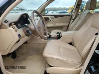 2001 Mercedes-Benz E-Class AWD with VIN WDBJF82J91X060969, listed as a Copart auction lot 71986544 with 113,694 mi miles and Salvage Title. Bid and sale history available at carsss.com. Image 7.