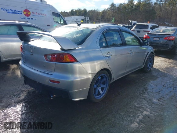 2008 Mitsubishi Lancer Evolution GSR with VIN JA3AW86V78U048263, listed as a IAAI auction lot 41670970 with 146,293 mi miles. Bid and sale history available at carsss.com. Image 4.