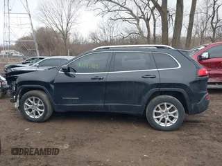 2016 Jeep Cherokee 75th Anniversary with VIN 1C4PJMCB7GW163641, listed as a IAAI auction lot 41743483 with 155,402 mi miles. Bid and sale history available at carsss.com. Image 15.