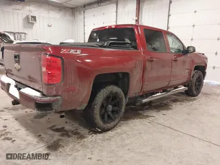2016 Chevrolet Silverado 1500 LT with VIN 3GCUKREC3GG216871, listed as a IAAI auction lot 41418693 with 97,074 mi miles. Bid and sale history available at carsss.com. Image 4.