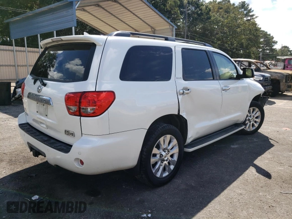 2010 Toyota Sequoia Platinum with VIN 5TDYY5G15AS024882, listed as a Copart auction lot 73760524 with 239,395 mi miles and Salvage Title. Bid and sale history available at carsss.com. Image 3.