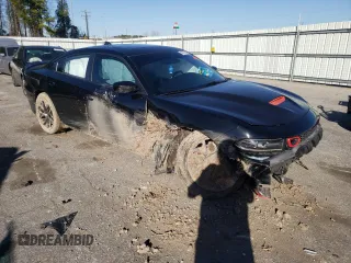 2018 Dodge Charger Daytona with VIN 2C3CDXCT4JH283018, listed as a Copart auction lot 48707905 with 121,624 mi miles and Salvage title. Bid and sale history available at DreamBid. Image 4.