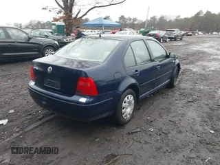 2003 Volkswagen Jetta GL with VIN 3VWRK69M43M161380, listed as a IAAI auction lot 41474524 with 55,757 mi miles and . Bid and sale history available at DreamBid. Image 4.