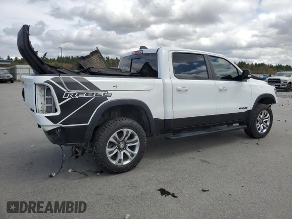 2020 Ram 1500 Rebel with VIN 1C6SRFLM1LN230872, listed as a Copart auction lot 55671585 with 97,202 mi miles and Salvage title. Bid and sale history available at DreamBid. Image 3.