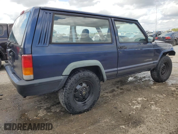 1997 Jeep Cherokee SE with VIN 1J4FT27P0VL612859, listed as a Copart auction lot 49869915 with 198,702 mi miles and Salvage title. Bid and sale history available at DreamBid. Image 3.