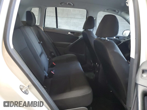2013 Volkswagen Tiguan S with VIN WVGAV3AX9DW626065, listed as a Copart auction lot 58014145 with 128,858 mi miles and Salvage title. Bid and sale history available at DreamBid. Image 11.