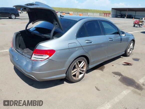2014 Mercedes-Benz C 250 Sport with VIN WDDGF4HB9EA961665, listed as a IAAI auction lot 42055533 with 112,404 mi miles and . Bid and sale history available at DreamBid. Image 4.