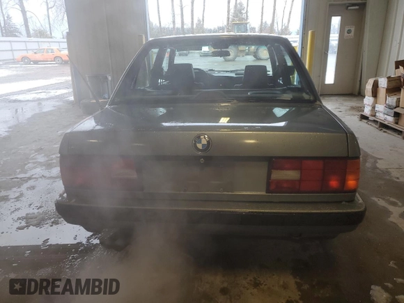 1989 BMW 3 Series 325i with VIN WBAAD2305KED23370, listed as a Copart auction lot 43777225 with 194,949 mi miles and Salvage Title. Bid and sale history available at carsss.com. Image 6.