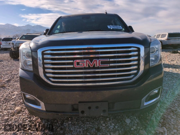 2018 GMC Yukon XL SLT with VIN 1GKS2GKC1JR105652, listed as a Copart auction lot 81405944 with 134,747 mi miles and Salvage Title. Bid and sale history available at carsss.com. Image 5.