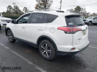 2017 Toyota RAV4 XLE with VIN JTMRFREV6HJ716907, listed as a IAAI auction lot 41056444 with 118,335 mi miles. Bid and sale history available at carsss.com. Image 3.