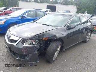 2009 Acura TSX with VIN JH4CU266X9C007198, listed as a IAAI auction lot 42535076 with 168,409 mi miles and . Bid and sale history available at DreamBid. Image 2.