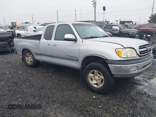 2000 Toyota Tundra SR5 with VIN 5TBBT4416YS094123, listed as a IAAI auction lot 41512147 with 263,330 mi miles and . Bid and sale history available at DreamBid. Image 1.
