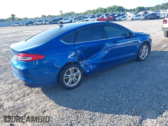 2018 Ford Fusion SE z VIN 3FA6P0H7XJR106776, wystawiony jako IAAI lot #42243361 z przebiegiem 174 000 mil mil oraz . Historia ofert i sprzedaży dostępna na DreamBid. Obrazek 4.