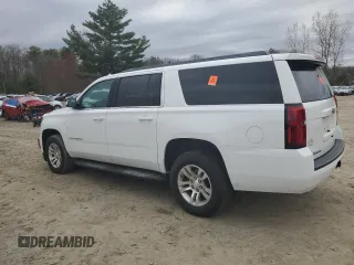 2019 Chevrolet Suburban LT with VIN 1GNSKHKC6KR205434, listed as a Copart auction lot 53950265 with 104,384 mi miles and Salvage Title. Bid and sale history available at DreamBid. Image 2.