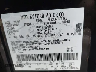 2007 Ford F-150 XL with VIN 1FTRF12W27NA65149, listed as a IAAI auction lot 41102740 with 230,647 mi miles. Bid and sale history available at carsss.com. Image 9.