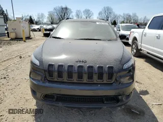 2015 Jeep Cherokee North with VIN 1C4PJMCS7FW750727, listed as a Copart auction lot 54077855 with 242,449 mi miles and Clean Title. Bid and sale history available at carsss.com. Image 5.