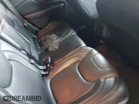 2014 Jeep Cherokee Limited with VIN 1C4PJMDS4EW182532, listed as a IAAI auction lot 42368726 with 124,060 mi miles and . Bid and sale history available at DreamBid. Image 8.