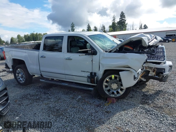 2019 GMC Sierra 2500HD Denali z VIN 1GT12SEY3KF269442, wystawiony jako IAAI lot #42231991 z przebiegiem 75 172 mil mil oraz . Historia ofert i sprzedaży dostępna na DreamBid. Obrazek 14.