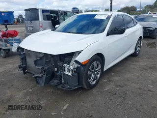 2018 Honda Civic LX with VIN 2HGFC2F5XJH603214, listed as a IAAI auction lot 41788384 with 114,876 mi miles and . Bid and sale history available at carsss.com. Image 18.