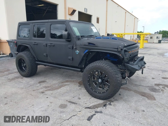 2018 Jeep Wrangler Unlimited Sport S z VIN 1C4HJXDG2JW228483, wystawiony jako IAAI lot #41710364 z przebiegiem 56 970 mil mil oraz . Historia ofert i sprzedaży dostępna na DreamBid. Obrazek 1.