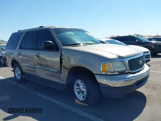 2001 Ford Expedition XLT z VIN 1FMRU15L71LA58316, wystawiony jako IAAI lot #42313058 z przebiegiem 179 916 mil mil oraz . Historia ofert i sprzedaży dostępna na DreamBid. Obrazek 1.