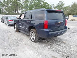 2019 Chevrolet Tahoe LT with VIN 1GNSCBKC7KR133119, listed as a IAAI auction lot 41570650 with 114,575 mi miles. Bid and sale history available at carsss.com. Image 3.