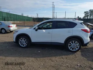 2014 Mazda CX-5 Grand Touring with VIN JM3KE4DY7E0425201, listed as a IAAI auction lot 41803597 with 118,867 mi miles. Bid and sale history available at carsss.com. Image 15.