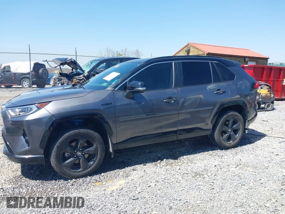 2021 Toyota RAV4 Hybrid XSE z VIN 4T3E6RFV4MU058397, wystawiony jako IAAI lot #42060980 z przebiegiem 236 612 mil mil oraz . Historia ofert i sprzedaży dostępna na DreamBid. Obrazek 14.