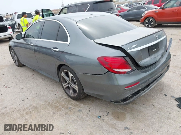 2018 Mercedes-Benz E 300 with VIN WDDZF4JB7JA357139, listed as a IAAI auction lot 42065511 with 54,812 mi miles and . Bid and sale history available at DreamBid. Image 3.