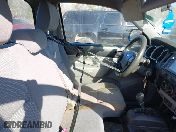 2014 Toyota Tacoma with VIN 5TFNX4CN9EX038101, listed as a IAAI auction lot 41487967 with 103,012 mi miles and . Bid and sale history available at DreamBid. Image 8.