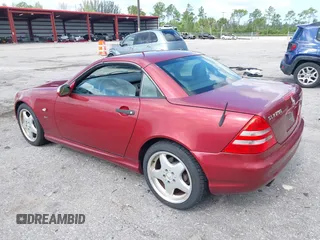 2000 Mercedes-Benz SLK 230 Kompressor with VIN WDBKK47F2YF146797, listed as a IAAI auction lot 42823113 with 35,881 mi miles and . Bid and sale history available at DreamBid. Image 3.