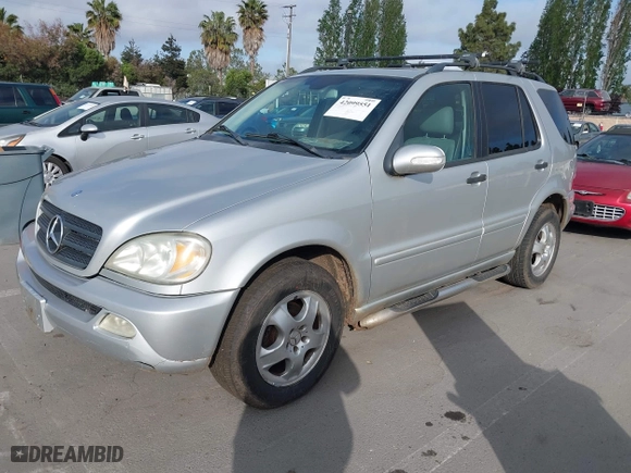 2003 Mercedes-Benz M-Class 3.7L with VIN 4JGAB57EX3A435535, listed as a IAAI auction lot 42099551 with 205,226 mi miles. Bid and sale history available at carsss.com. Image 2.