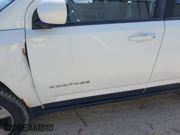 2016 Jeep Compass High Altitude with VIN 1C4NJDEB4GD767731, listed as a IAAI auction lot 41977400 with 99,890 mi miles and . Bid and sale history available at DreamBid. Image 17.