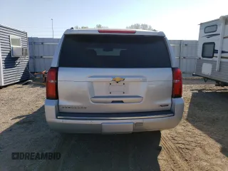 2017 Chevrolet Suburban Premier with VIN 1GNSKJKC4HR316953, listed as a Copart auction lot 76944884 with 105,753 mi miles and Salvage Title. Bid and sale history available at DreamBid. Image 6.