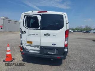 2021 Ford Transit Passenger XL z VIN 1FBAX2Y84MKA14973, wystawiony jako IAAI lot #42149017 z przebiegiem 105 171 mil mil oraz . Historia ofert i sprzedaży dostępna na DreamBid. Obrazek 17.