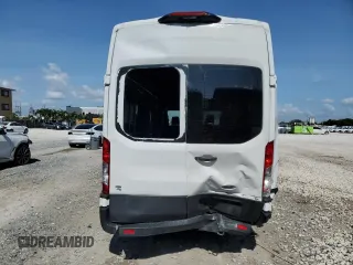 2021 Ford Transit Cargo with VIN 1FTBR3X83MKA58920, listed as a Copart auction lot 59946095 with 65,655 mi miles and Salvage title. Bid and sale history available at DreamBid. Image 6.